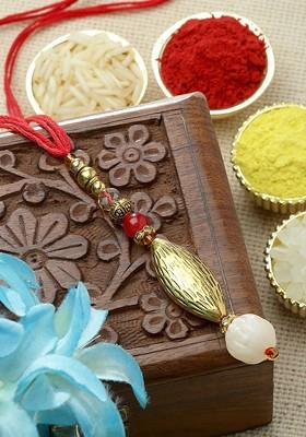 Gold Toned Rakhi Gift Set
