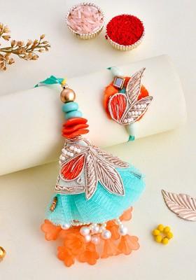 Unisex Set Of 2 Dropped Flowers Pastel Bhaiya Bhabhi Rakhi Gift Set