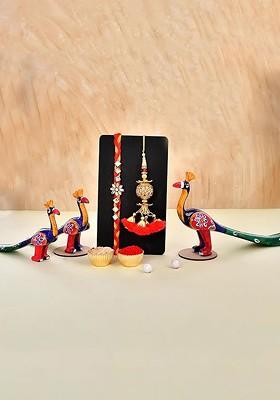 7 Pcs Rakhi With Showpiece And Tilak With Greetingcard
