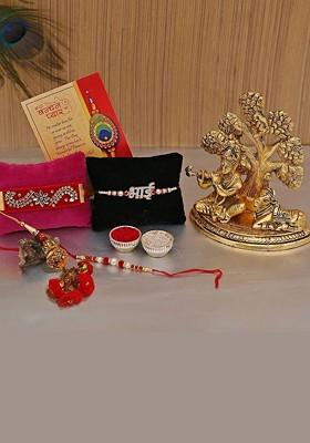 7 Pcs Rakhi With Showpiece And Tilak With Greetingcard