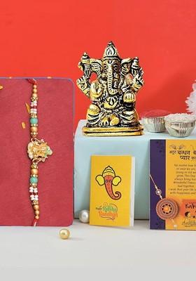 4 Pcs Lord Ganesh Showpiece With Greeting Card And Roli Chawal Rakhi Gift Set