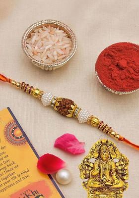 4 Pcs Rakhi With Showpiece And Tilak With Greetingcard