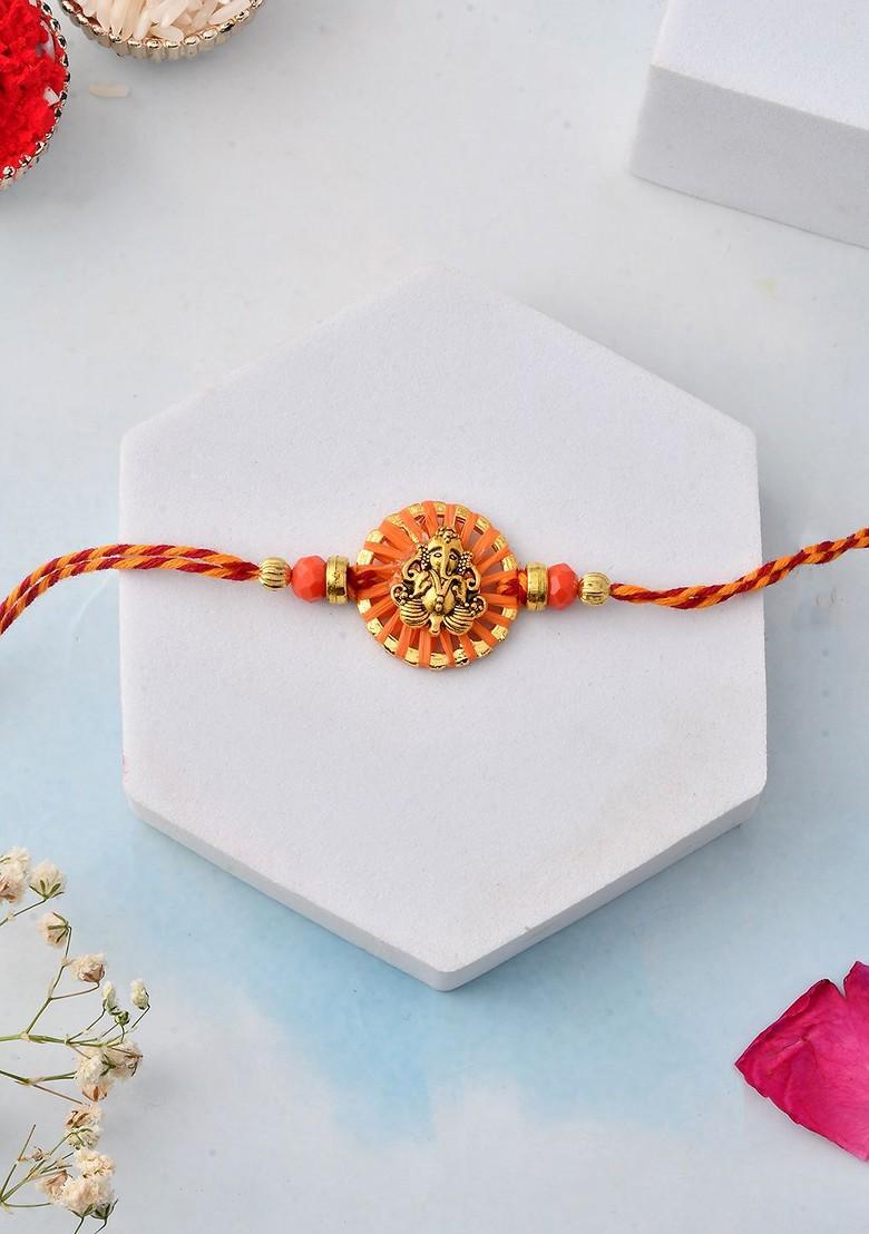 Auspicious Vinayak And Circular Charm Rakhi With Roli Rice And Greeting Card