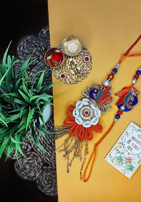 Set Of 2 Orange Peacock Design Bhaiya Bhabhi Thread Rakhis With Roli Chawal