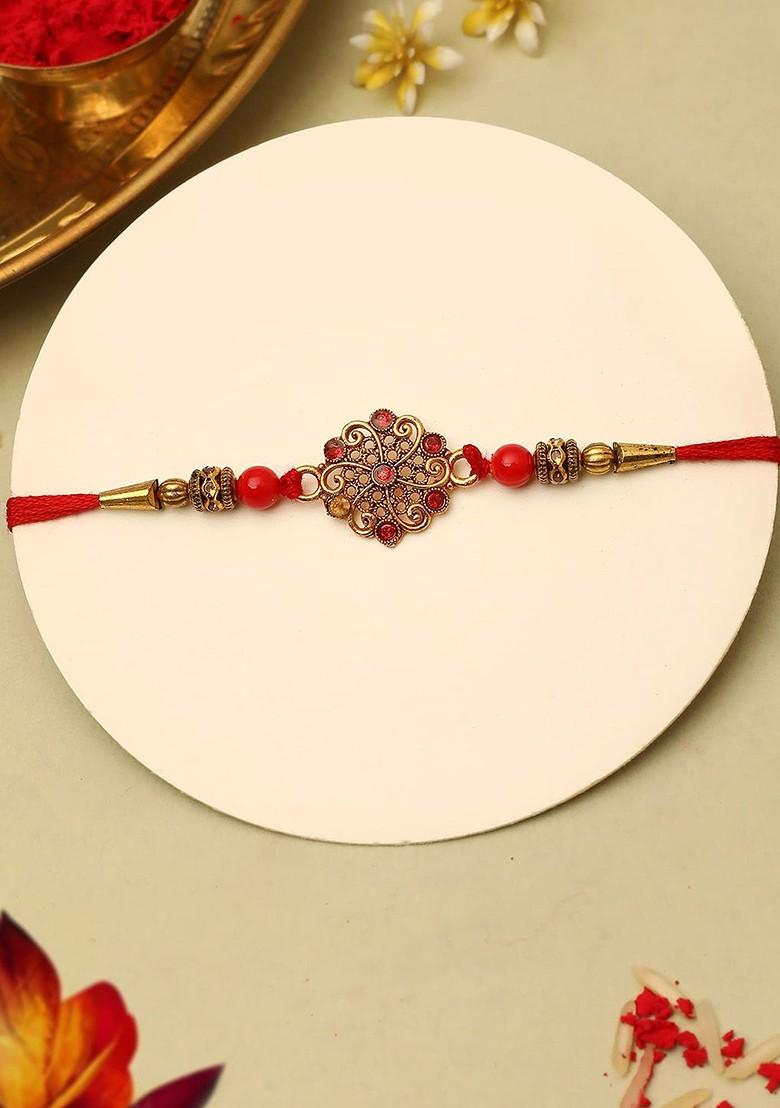 Stone Studded Rakhi And Printed Cushion Gift Set