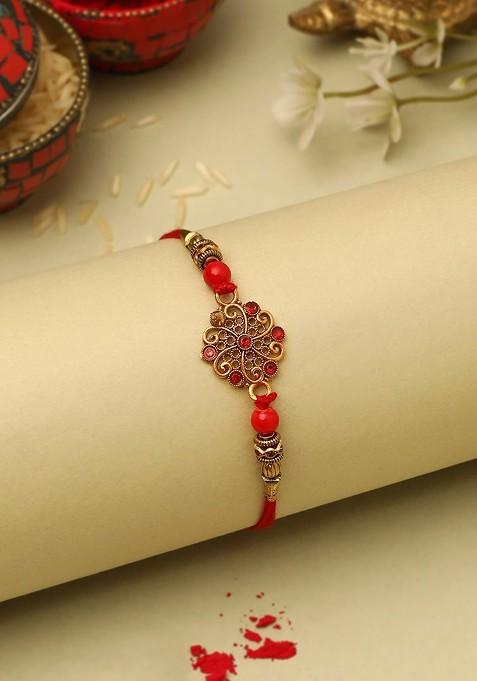 Stone Studded Rakhi And Cushion Gift Set