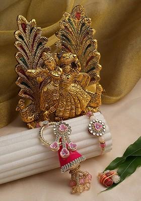 Unisex Gold Plated Rakhi With Radha Krishna Idol And Roli Chawal