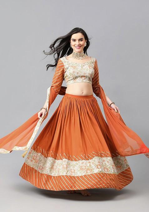 Orange Woven Design Blended Lehenga Choli — view on Indya