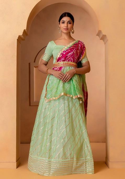 Green Embellished Blended Lehenga Choli — view on Indya