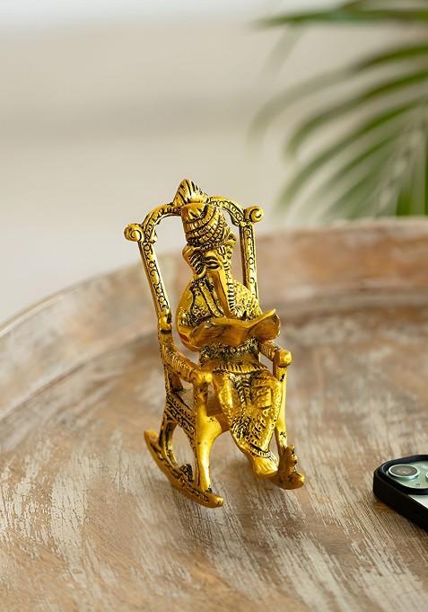 Gold Toned Ganesha On Rocking Chair Idol Decorative Showpiece Figurine