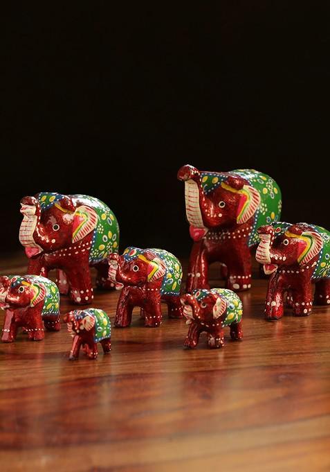 Set Of 7 Maroon And Green Handcarved Elephants Showpieces