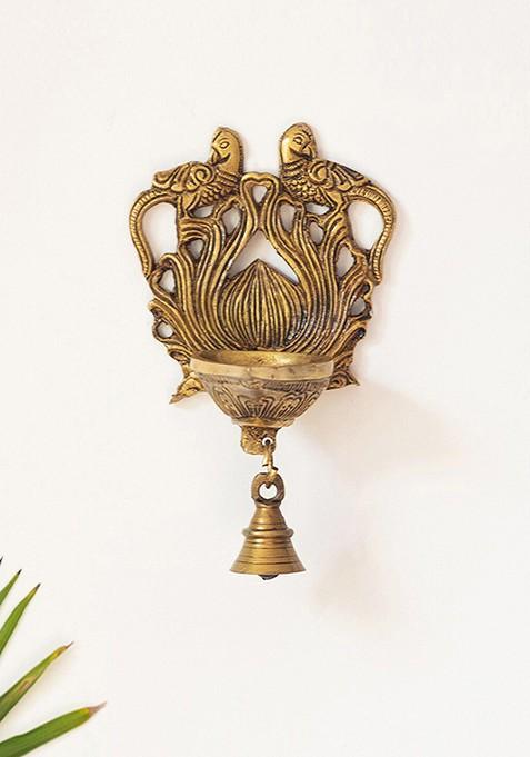 Gold Toned Textured Hand Etched Wall Hanging Peacock Diya With Bell