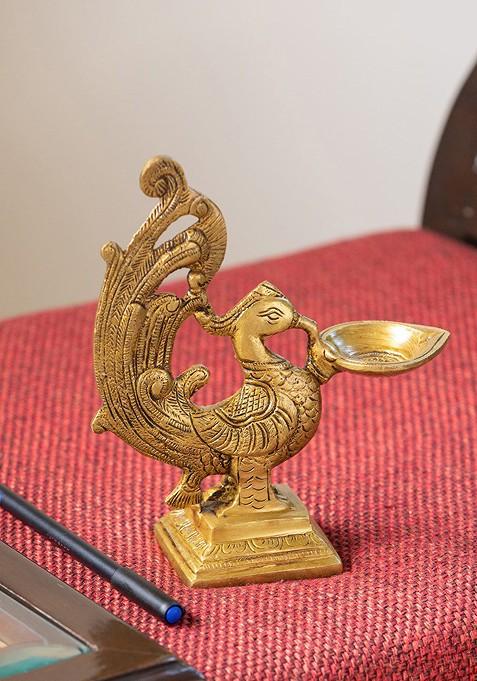 The Brass Beams Gold Toned Textured Marvellous Peacock Shaped Diya