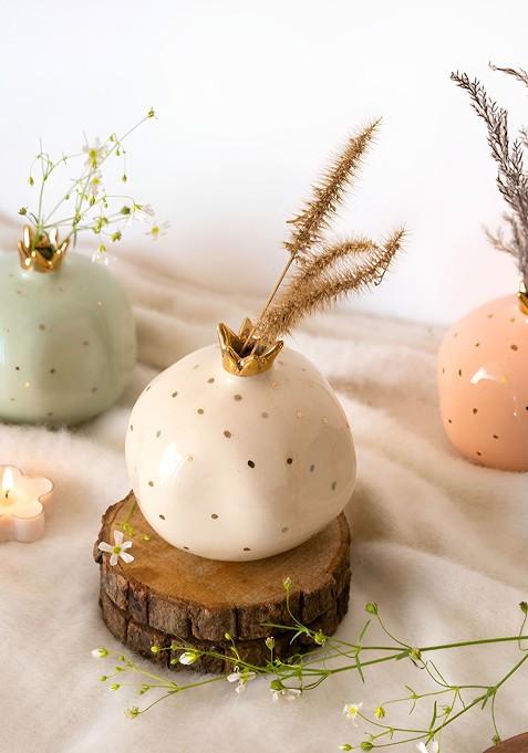 Off White And Gold Toned Pomegranate Figurine Showpiece