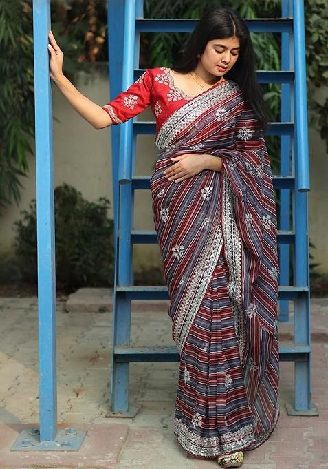 Red Embroidered Blended Saree Set — view on Indya