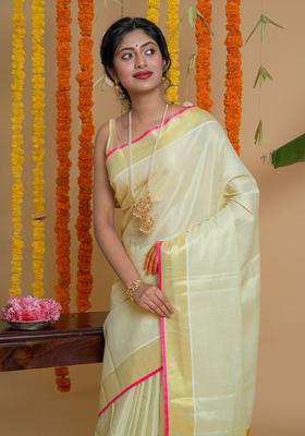Off White Solid Tissue Saree Set