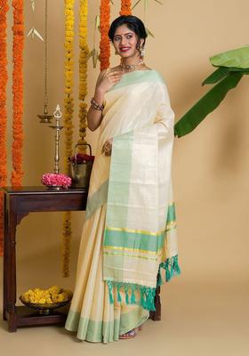 Off White Solid Tissue Saree Set