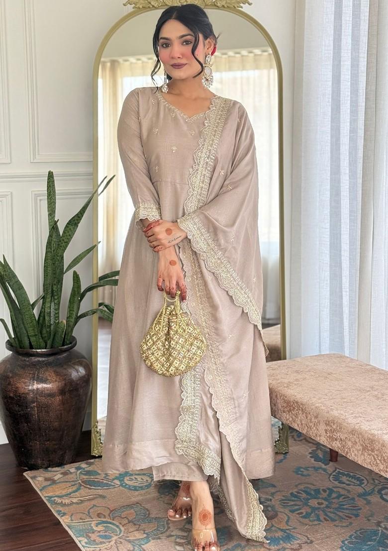 Cream Embroidered Poly Blended Kurta Sets