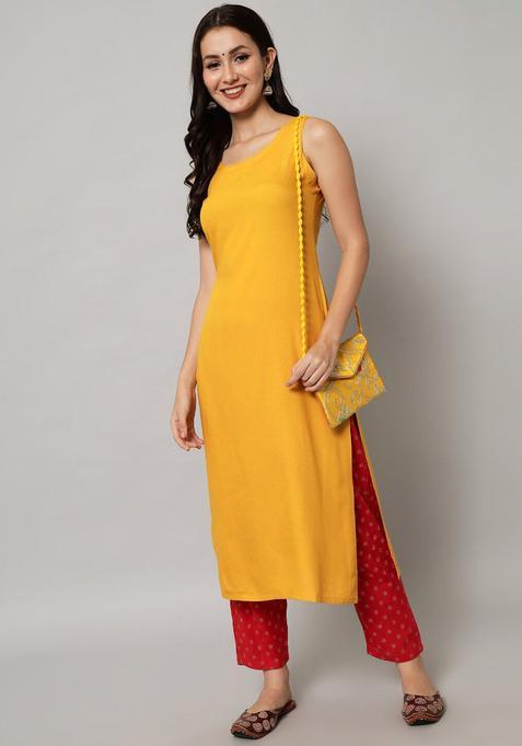 Yellow Solid Viscose Kurta Set — view on Indya