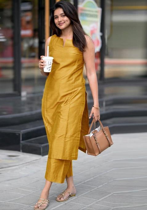 Yellow Solid Viscose Kurta Set — view on Indya