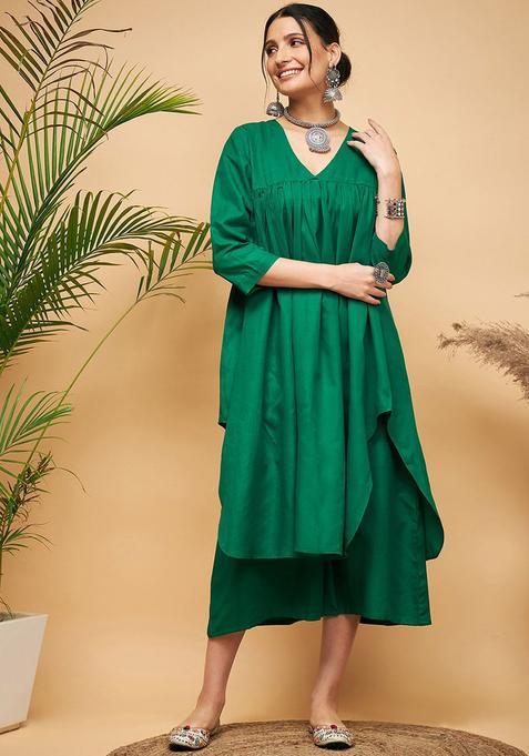 Green Solid Viscose Kurta Set — view on Indya