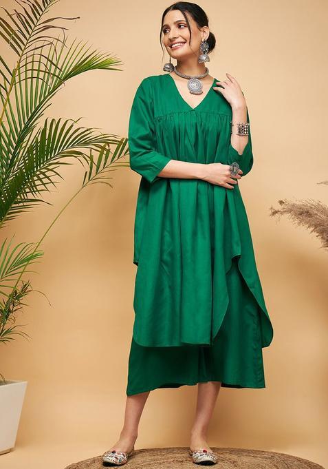 Green Solid Viscose Kurta Set — view on Indya