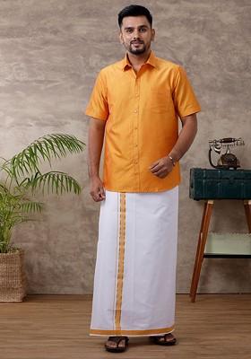 Yellow Solid Traditional Cotton Shirt And Matching Fancy Border Dhoti For Men