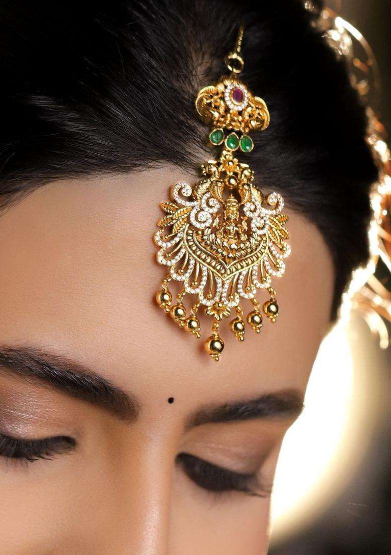 22K Gold-Plated Ruby Red, Emerald Green & CZ Temple Lakshmi Maang Tikka with Zircon for Women | Traditional Temple Jewellery for Wedding & Festive Wear | Gift for Her - Indya