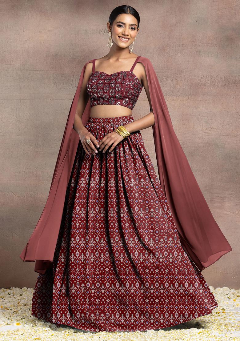 Maroon Lehenga Set With Swarovski Hand Embroidered Cape Sleeve Blouse