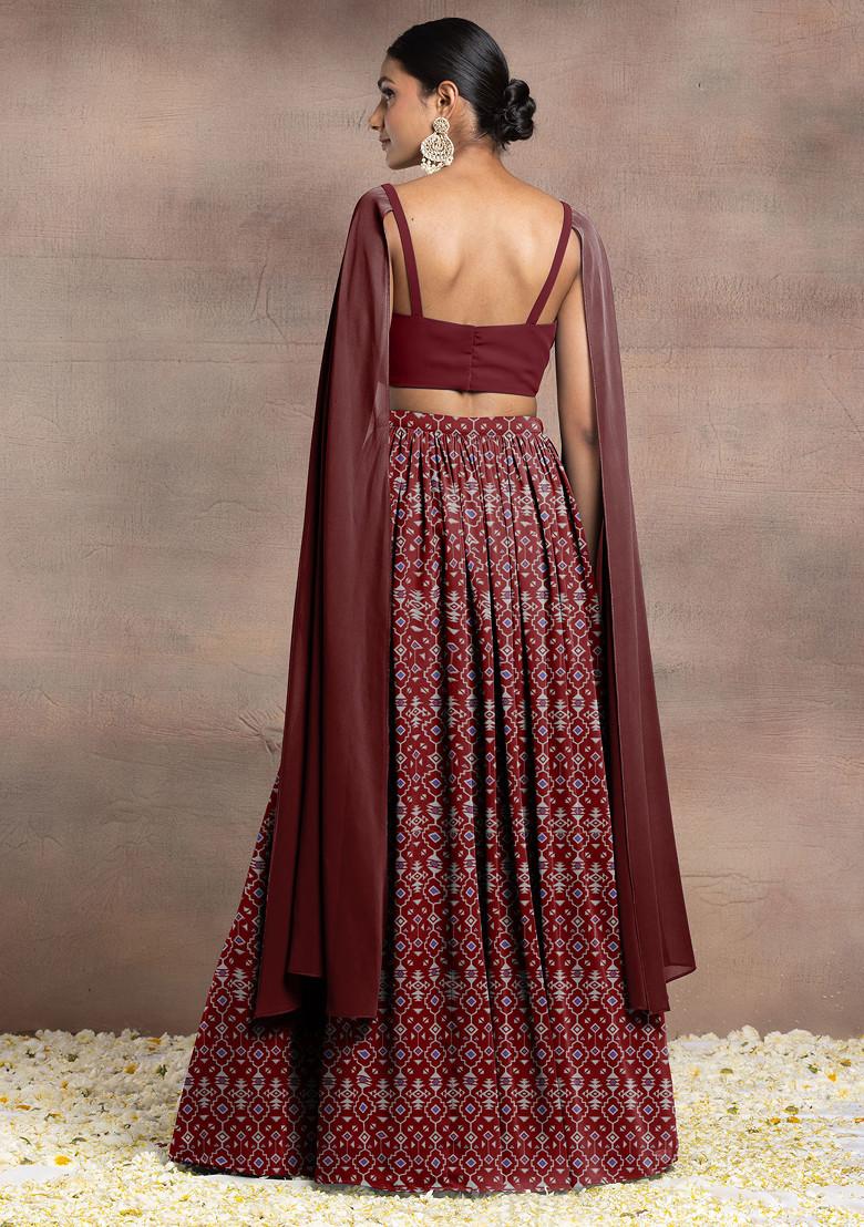 Maroon Lehenga Set With Swarovski Hand Embroidered Cape Sleeve Blouse