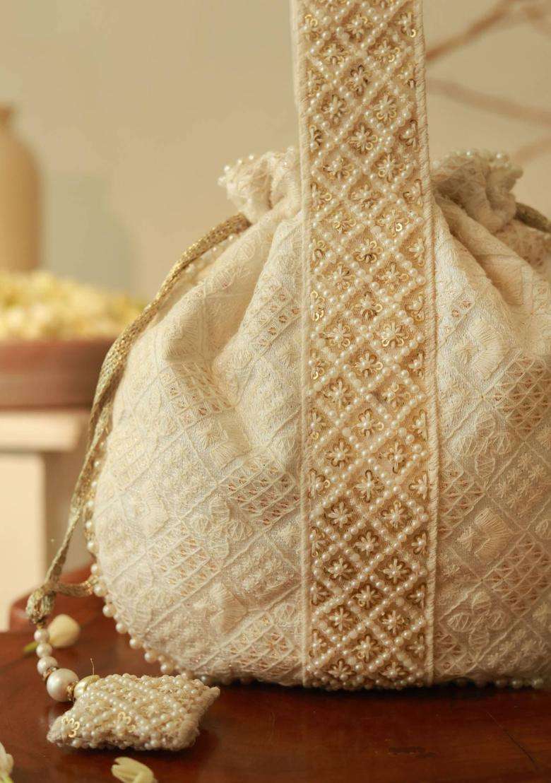 White Embroidered Cotton Batuas & Potlis - Indya