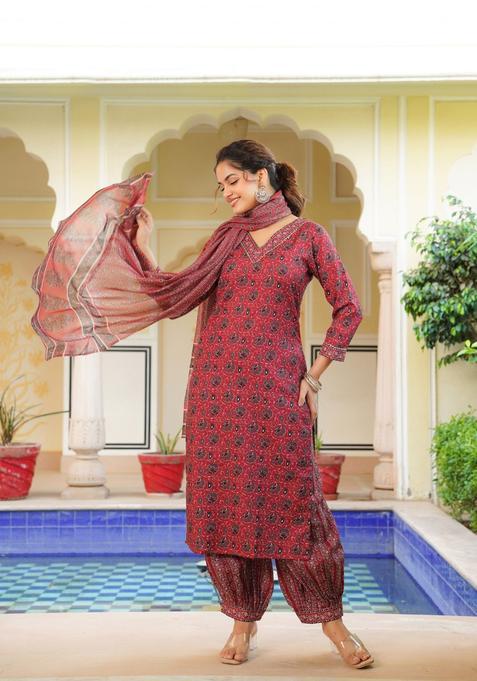 Red Printed Rayon Salwar Suit Set — view on Indya