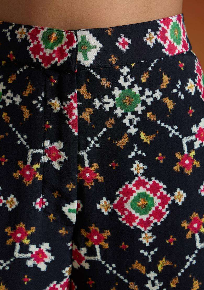 Black Modal Muslin Patola Printed Bell Bottom Pant for Women Party Wear - Indya