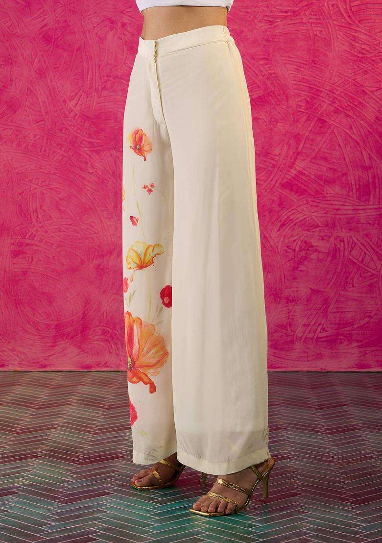 Off White Crepe Poppy Print Pants for Women Party Wear - Indya