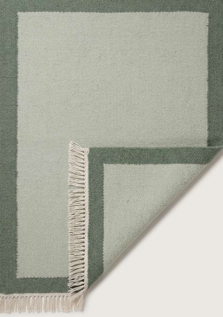 100% Wool Handmade Sage Green Rug | Minimalist Solid Flat Weave Reversible Carpet For Living Room - Indya
