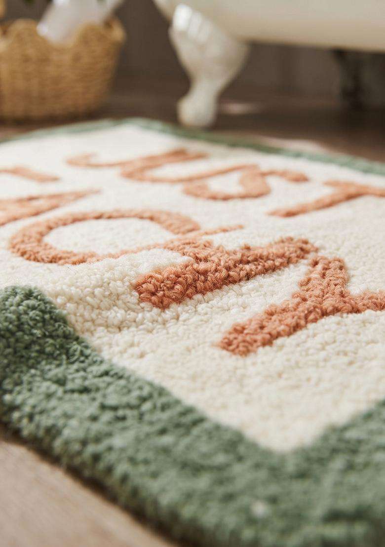 Saffron Rugs Hand Tufted Cotton Bath Mat | Cream and Green Rectangular | Anti Slip Backing | Casual Typography BATHMATS Bathroom Rug - Indya