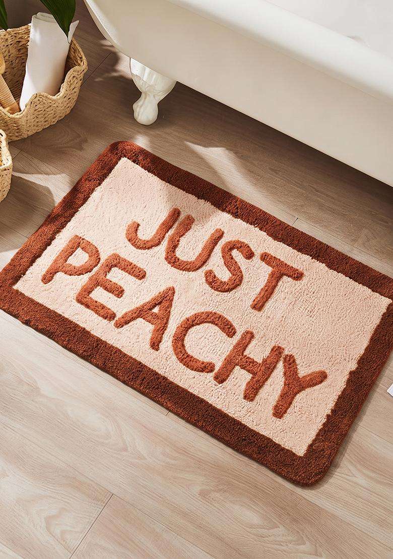Saffron Rugs Hand Tufted Cotton Bath Mat | Brown Peach Rectangular | Anti Slip Backing | Casual Typography BATHMATS Bathroom Rug - Indya