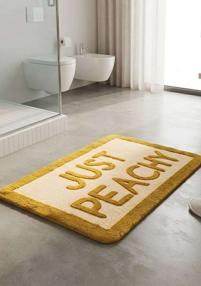 Saffron Rugs Hand Tufted Cotton Bath Mat | Mustard Yellow Rectangular | Anti Slip Backing | Casual Typography BATHMATS Bathroom Rug - Indya