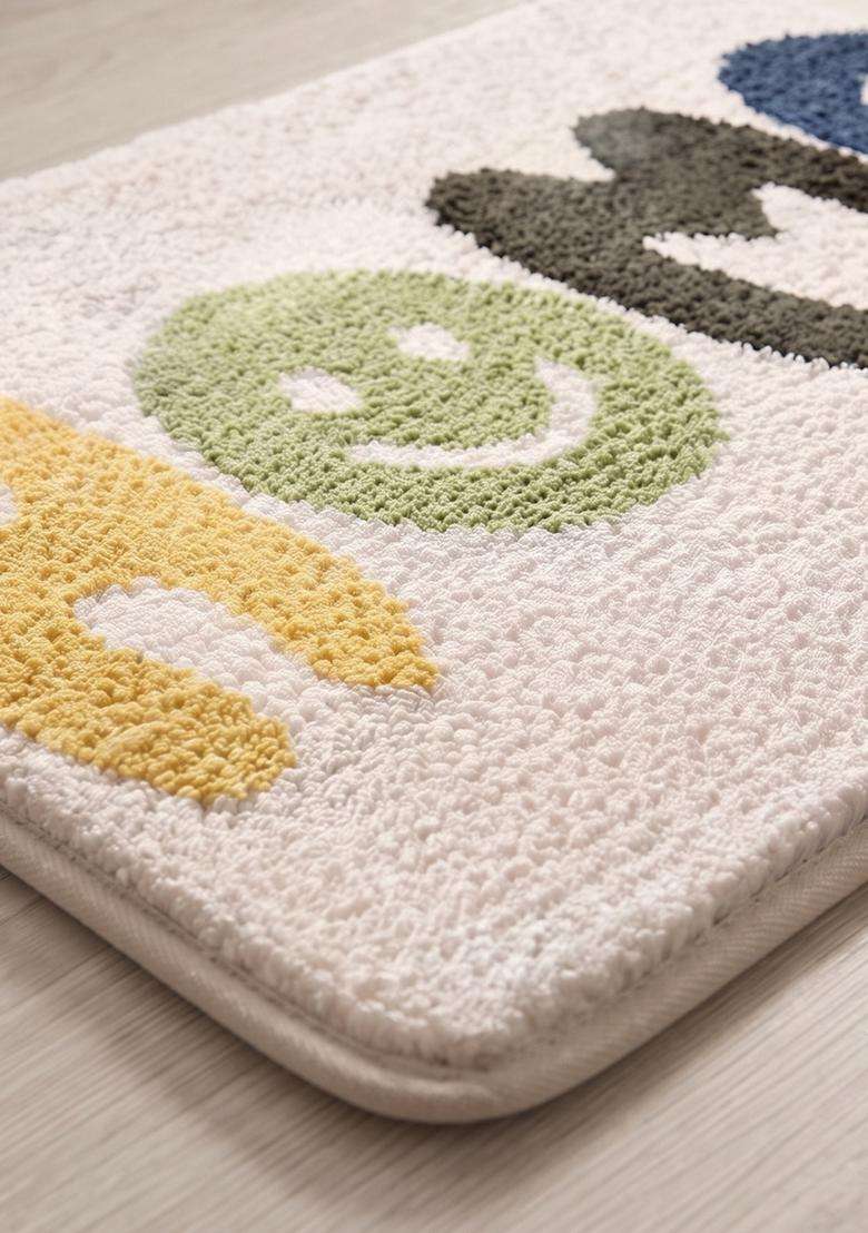 Saffron Rugs Hand Tufted Cotton Bath Mat | White Multicolor Rectangular | Anti Slip Backing | Casual Typography BATHMATS Bathroom Rug - Indya