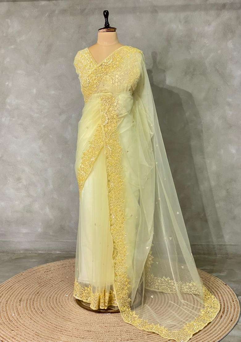 Pastal Yellow Net Bridal Designer Saree With Traditional Woven Design For Women - Indya