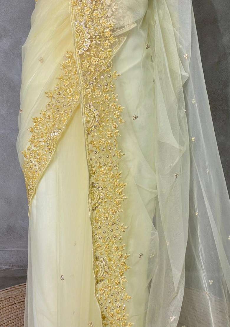 Pastal Yellow Net Bridal Designer Saree With Traditional Woven Design For Women - Indya
