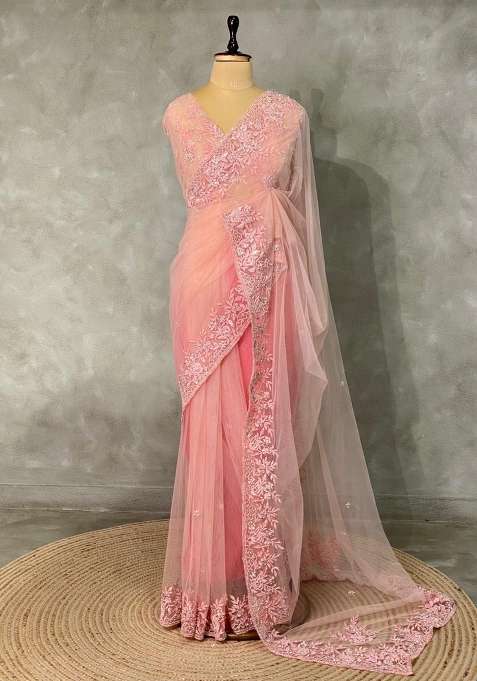 Pastal Peach Net Bridal Designer Saree With Traditional Woven Design For Women