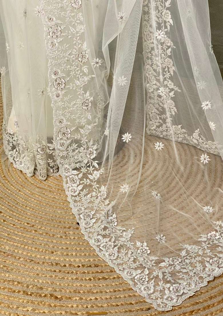White Net Bridal Designer Saree With Traditional Woven Design For Women - Indya