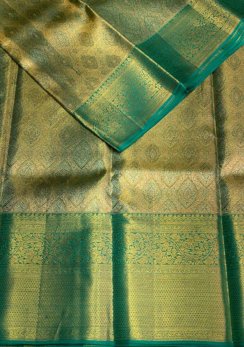 Green Pure Tissue Kanchipuram Silk Saree With Traditional Woven Design For Women - Indya