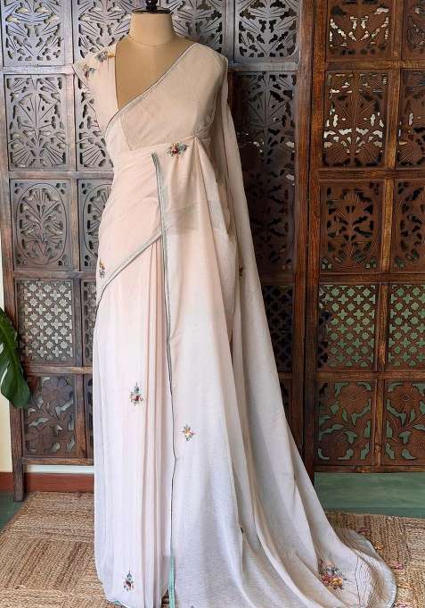 Nude Pink Soft Chiffon Saree With Traditional Woven Design For Women