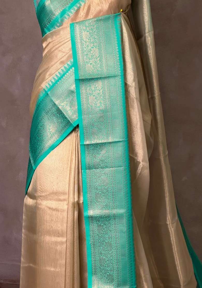 Gold Soft Tissue Silk Saree With Traditional Woven Design For Women - Indya