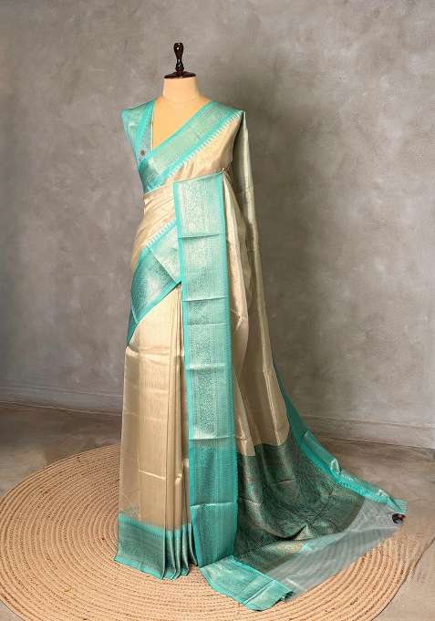 Gold Soft Tissue Silk Saree With Traditional Woven Design For Women