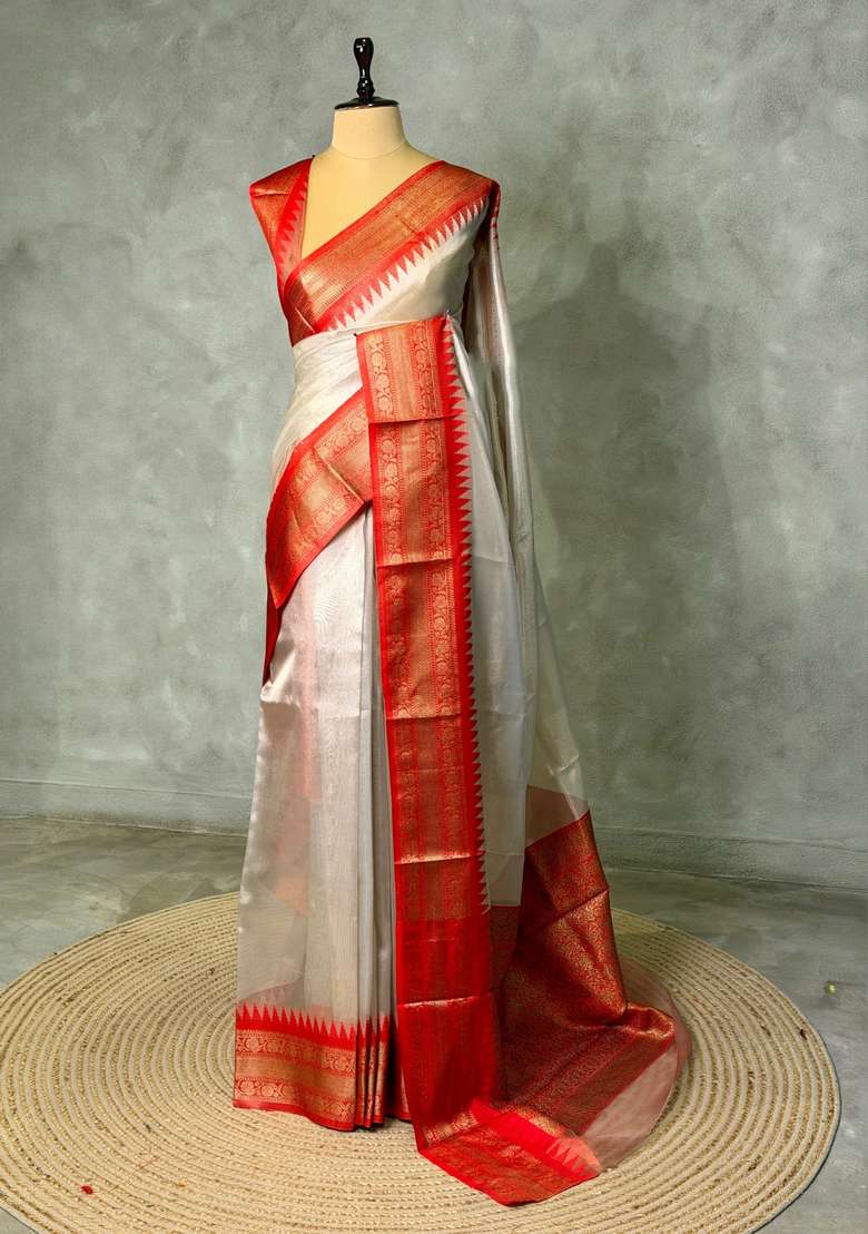 Gold Soft Tissue Silk Saree With Traditional Woven Design For Women - Indya