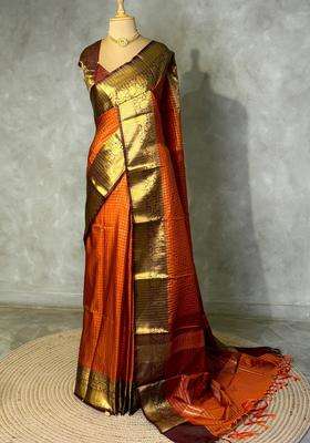 Rust Orange And Brown Banarasi Silk Saree With Traditional Woven Design For Women