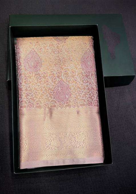 Lavender Tissue Kanchipuram Saree With Traditional Woven Design For Women